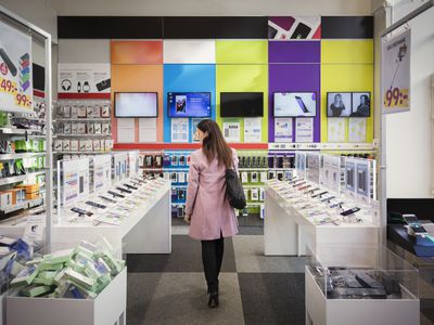 Woman in phone store.