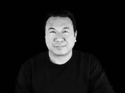 A black and white portrait of Jack Li. 