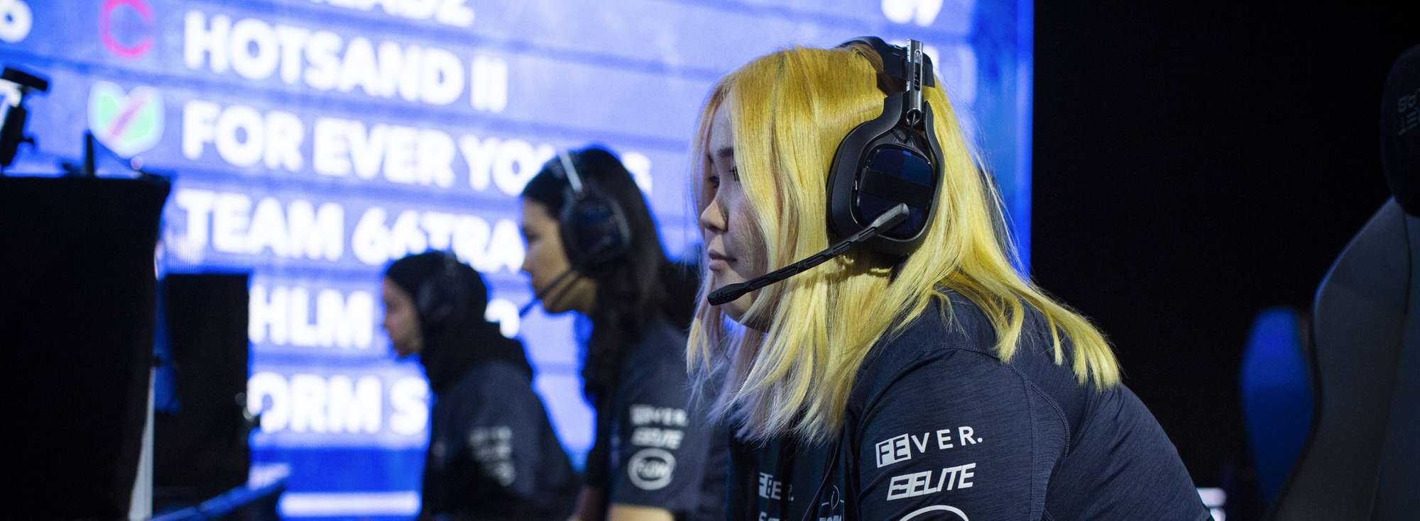 Female gamers playing during an e-sports tournament. 